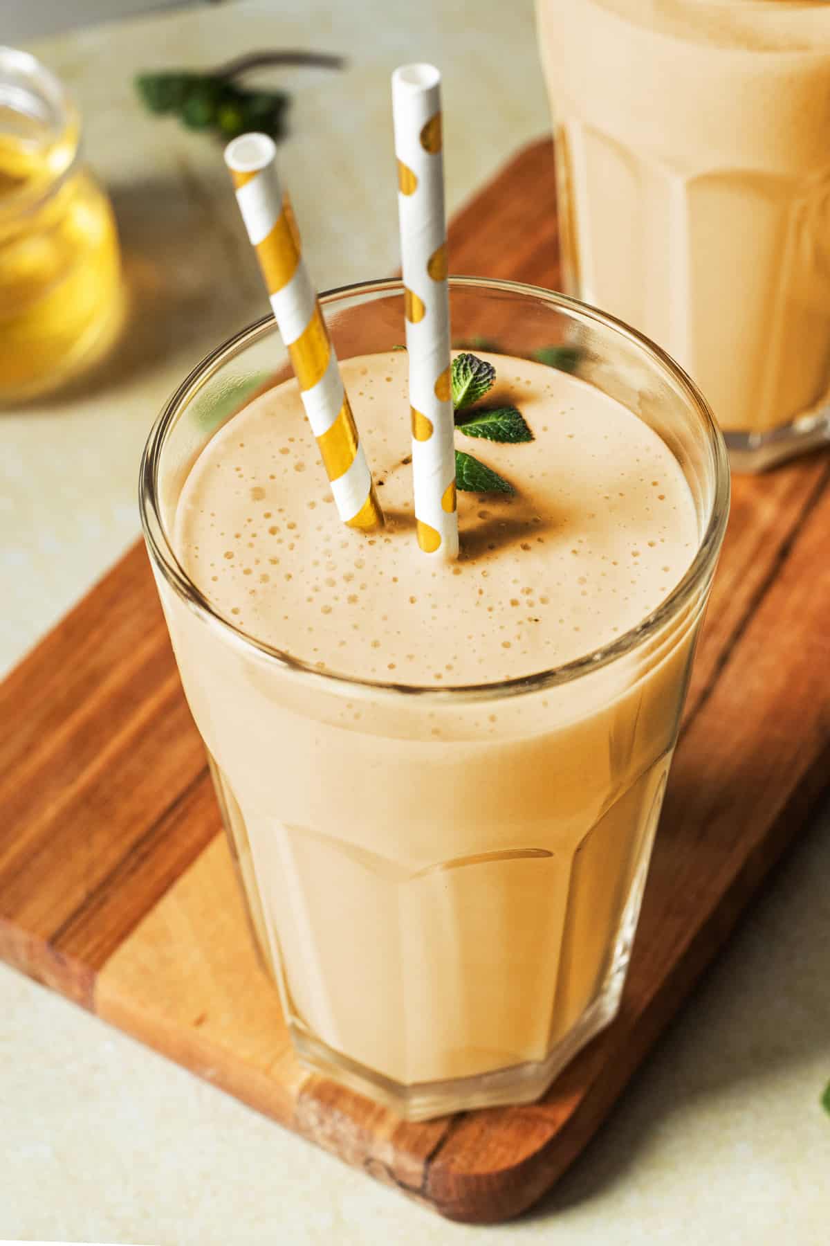 Easy Creamy Peach Smoothie on the table