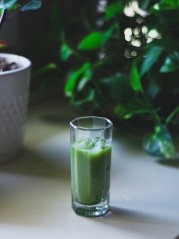 drinking glass with green drink